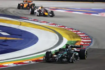 F1 Singapore GP: George Russell wins from pole as McLaren take constructors' crown