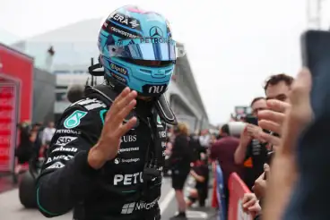 Russell grabs pole in Canada