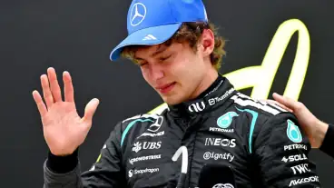 Antonelli, Ferrari give F1 feel-good race but critics remain